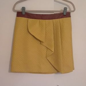 Anthropologie mustard quilted mini skirt